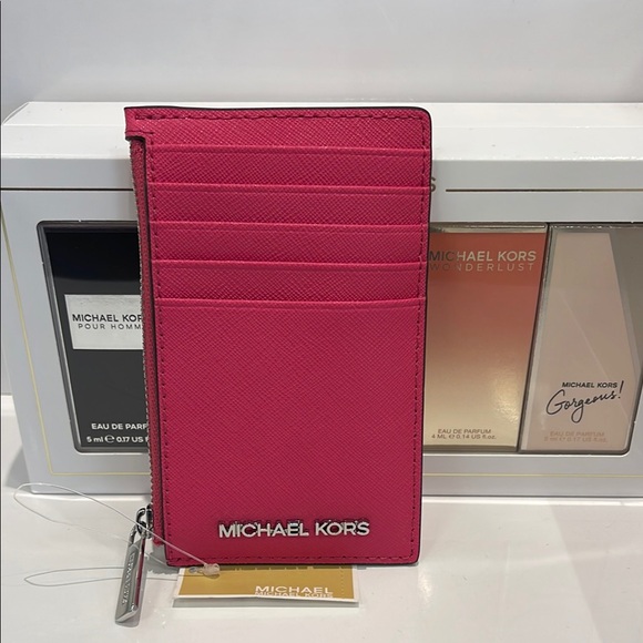 Michael Kors Handbags - MICHAEL KORS
Jet Set Travel Medium Top Zip Leather Card Case Wallet 
Dragonfruit